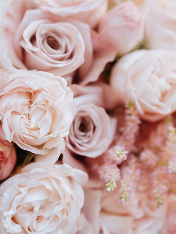 Wedding flowers, bridal bouquet closeup. Decoration made of roses, peonies and decorative plants, close-up, selective focus, nobody, objects